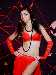 KiloPics presents: Only one look in the eyes of this fantastic slim teen will tell that she is a little devil inside. No further costume is needed.