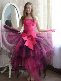 KiloPics presents: Gorgeous teen cutie stripping an evening dress and showing body in front of a big mirror.