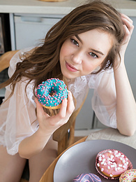 KiloPics presents: If you are a fan of skinny girls, check out how this cute little doll poses and teases totally naked in the kitchen.