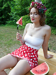 KiloPics presents: Nice belarusian stunner Rokki removes all clothes on a blanket in a backyard